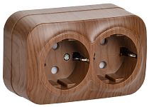 Розетка двухместная для открытой установки РСш22-3-ХД с заземлением и защитной шторкой 16А GLORY дуб  IEK Розетка двухместная для открытой установки РСш22-3-ХД с заземлением и защитной шторкой 16А GLORY дуб  IEK